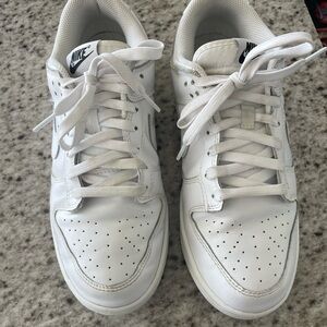 All white Nike low dunks